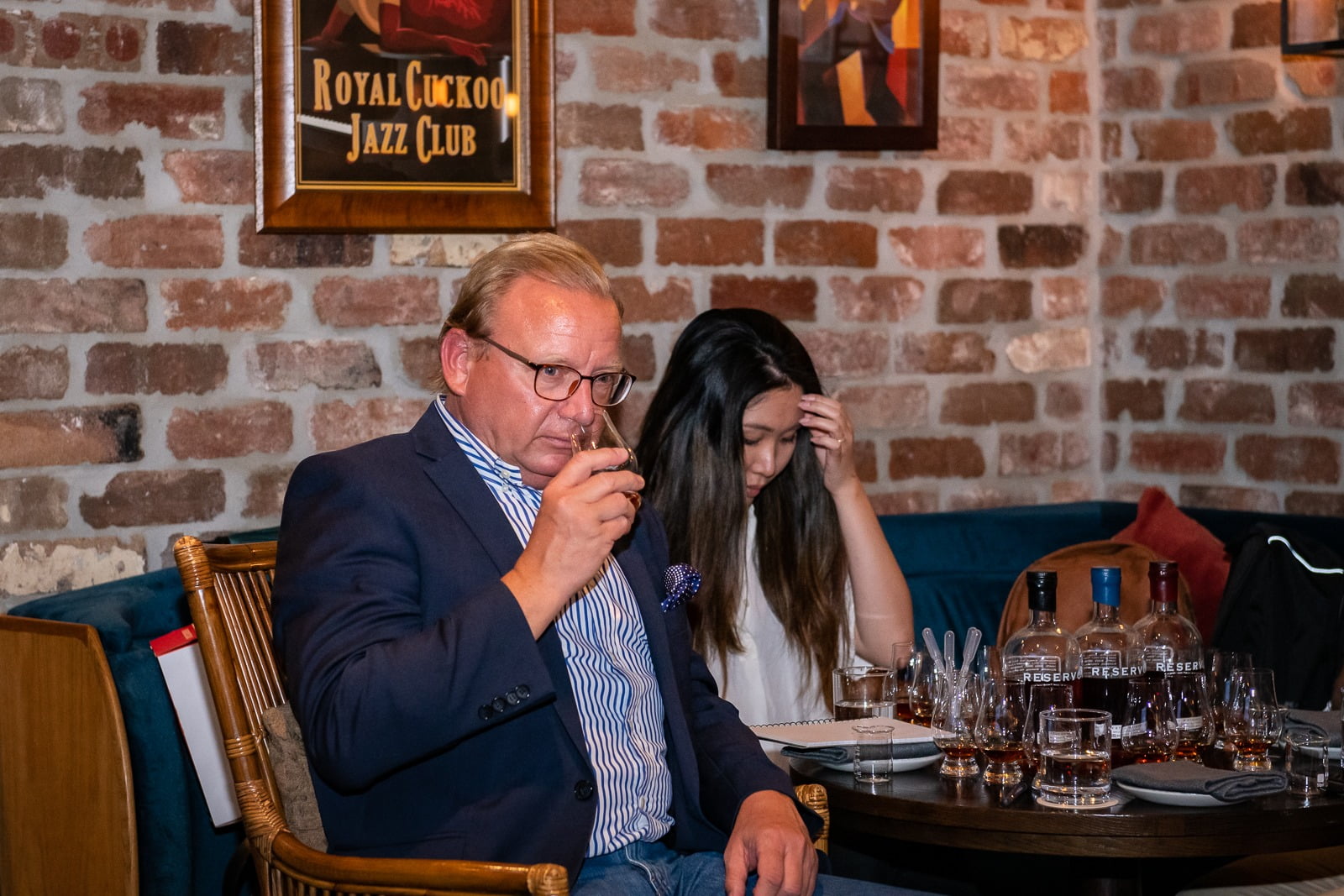 A guest smelling a particular whiskey blend